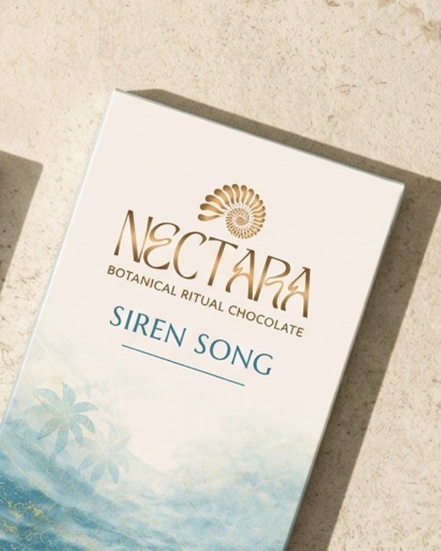 The Siren Song carton on pale stone.